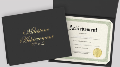 Employee recognition certificates displayed in a premium black milestone achievement certificate holder