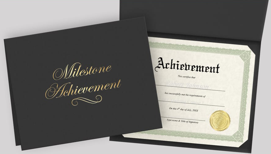 Employee recognition certificates displayed in a premium black milestone achievement certificate holder