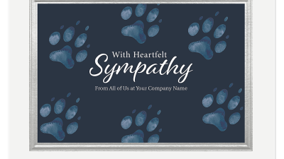 Pet sympathy cards featuring blue paw prints and a heartfelt sympathy message